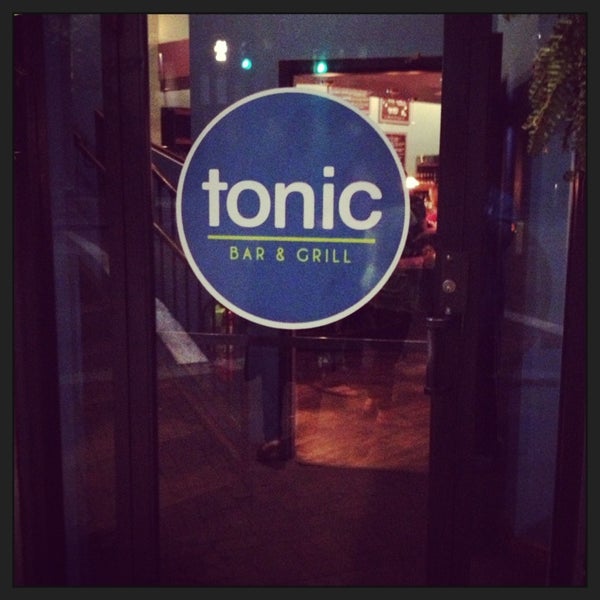 Photo taken at Tonic Bar And Grill by Jamie on 8/26/2013