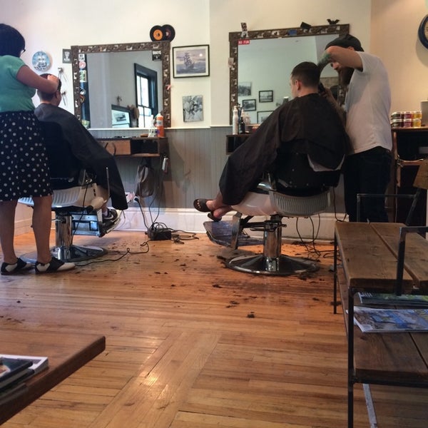 Photo taken at Garrison&#39;s by the park Barbershop by Paulo on 6/7/2014