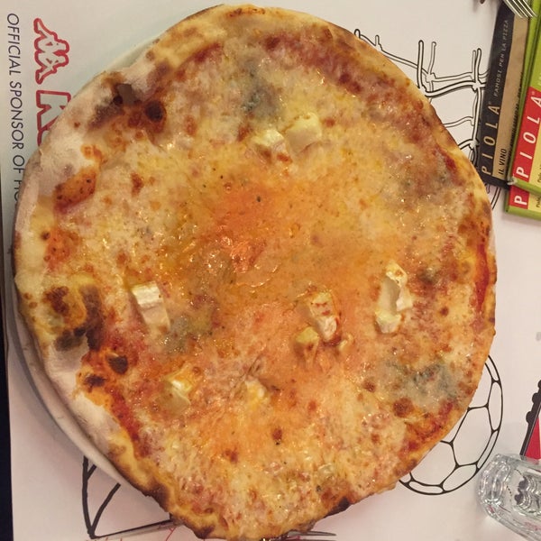 Photo taken at Piola Pizza by Altuğ on 6/12/2017