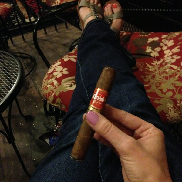 Photo taken at Burns Tobacconist Downtown by Erin on 4/7/2013