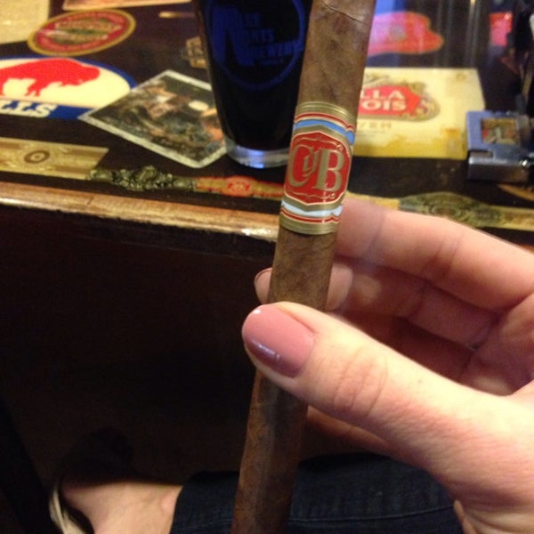 Photo taken at Crown Cigars and Ales by Erin on 3/9/2014