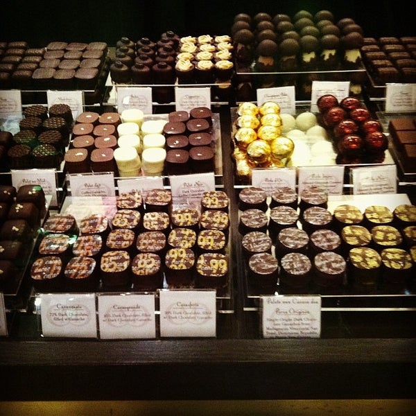 Photo taken at Chocolat Michel Cluizel by Rae T. on 10/8/2012