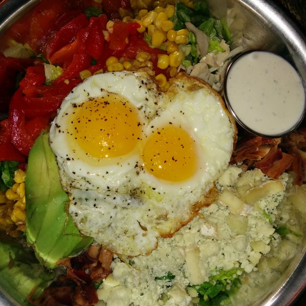 Smoked Cobb Chop for the win... Roasted turkey, bacon, avocado, brie and topped with 2 fried eggs. So good for lunch!