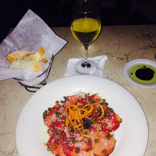 Photo taken at Di Parma Trattoria by Mariana C. on 6/27/2015