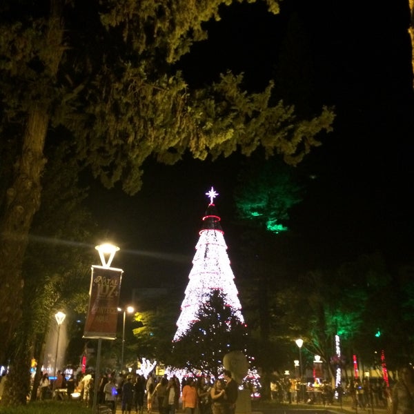 Photo taken at Praça Tubal Vilela by Carlos Henrique V. on 12/21/2014