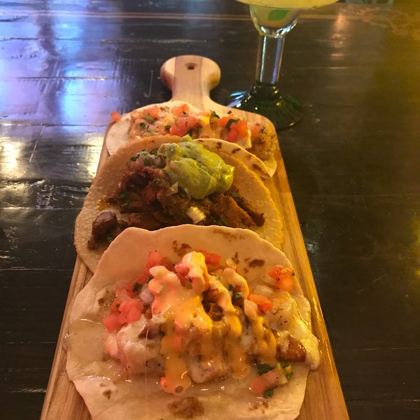Photo taken at En Fuego Cantina &amp; Grill by Gina SuuperG S. on 5/26/2018