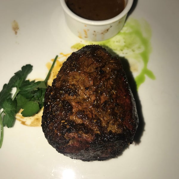 Photo taken at Bobby Flay Steak by Dawn D. on 3/21/2018