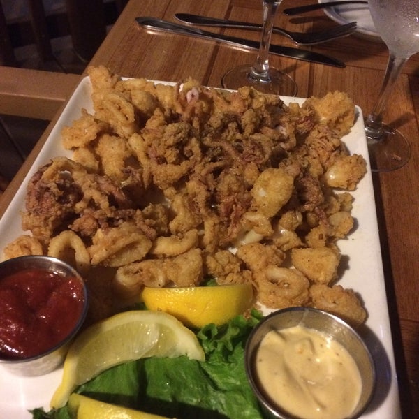Photo taken at Fish Tale Grill by Merrick Seafood by Christoph M. on 3/21/2015