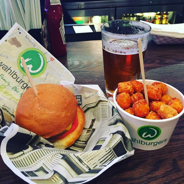 Photo taken at Wahlburgers by Eric P. on 12/20/2015