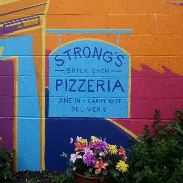Photo taken at Strong&#39;s Brick Oven Pizzeria by Linda P. on 6/2/2013