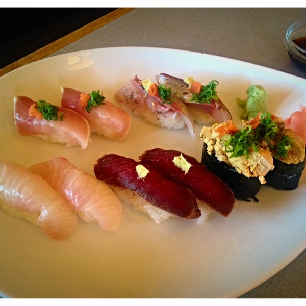 Photo taken at Koi Japanese Cuisine by Helen T. on 7/24/2014