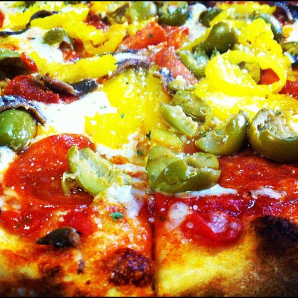 Photo taken at Solorzano Bros. Pizza by Carlos S. on 10/5/2012