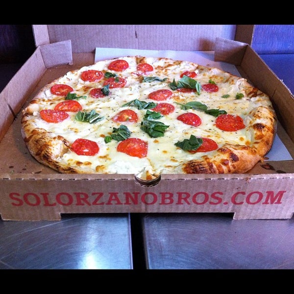 Photo taken at Solorzano Bros. Pizza by Carlos S. on 10/20/2012