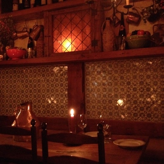 Photo taken at Convivium Osteria by Polina on 12/24/2012