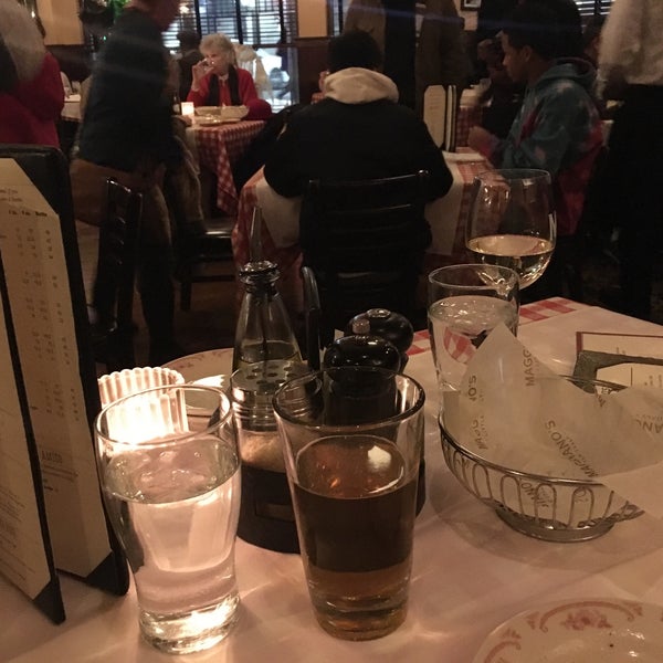 Photo taken at Maggiano&#39;s Little Italy by Joe H. on 12/28/2017
