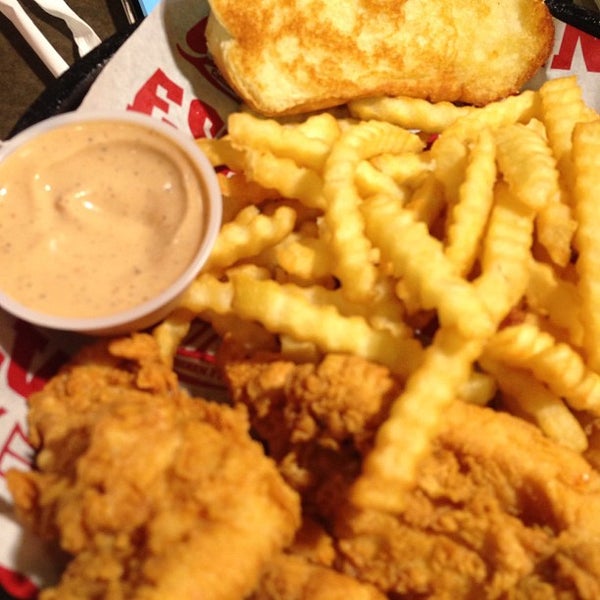 Photo taken at Raising Cane&#39;s Chicken Fingers by Krystal E. on 8/25/2013