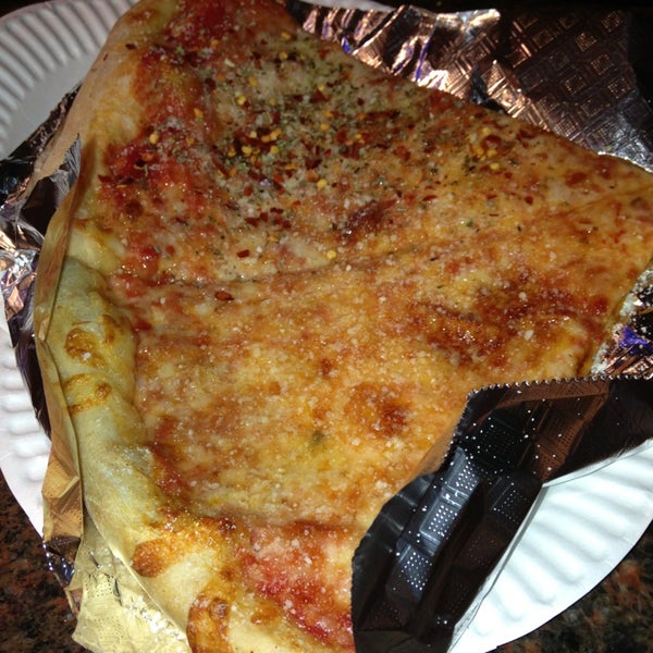 Photo taken at The Big Slice - 5th Ave by Laura D. on 3/12/2013