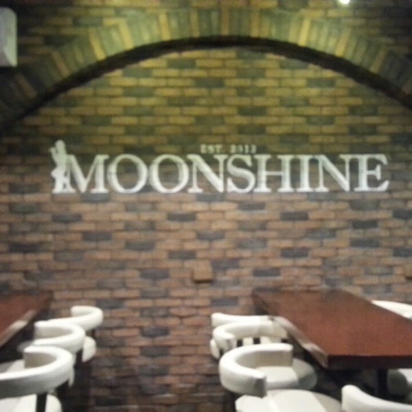 Photo taken at Moonshine Bar by Hoton E. on 1/31/2014