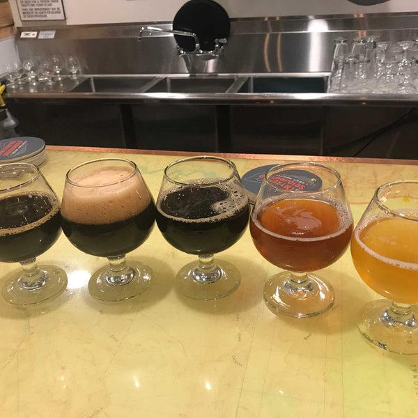 Photo taken at The Intrepid Sojourner Beer Project by Kevin N. on 12/16/2018