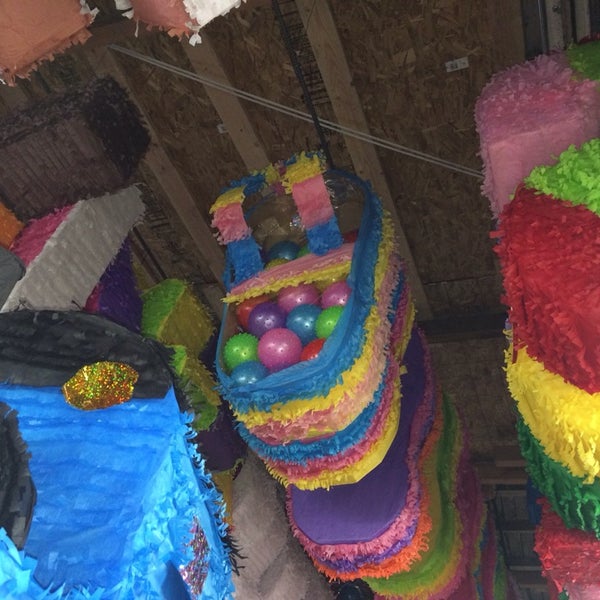Photo taken at Piñata District - Los Angeles by Jose L. on 2/9/2014