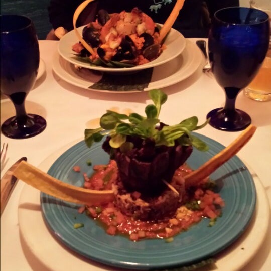 Photo taken at Ola Restaurant by Brian B. on 2/2/2014