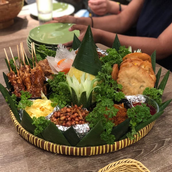 Try their Nasi Tumpeng deluxe that suitable for 10 pax. Make a reservation and order this one day in advance and enjoy it in their restaurant.