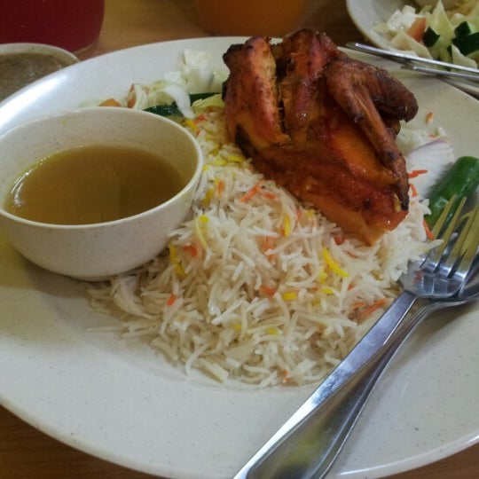 Photo taken at Al Raudah Arabian Food by mfaizuddin on 11/2/2012