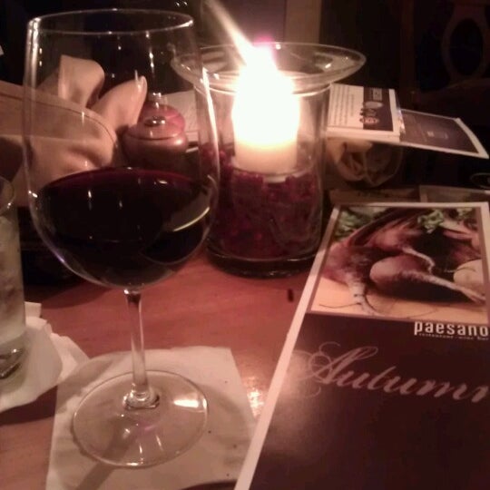 Photo taken at Paesano Italian Restaurant and Wine Bar by Day on 12/16/2012