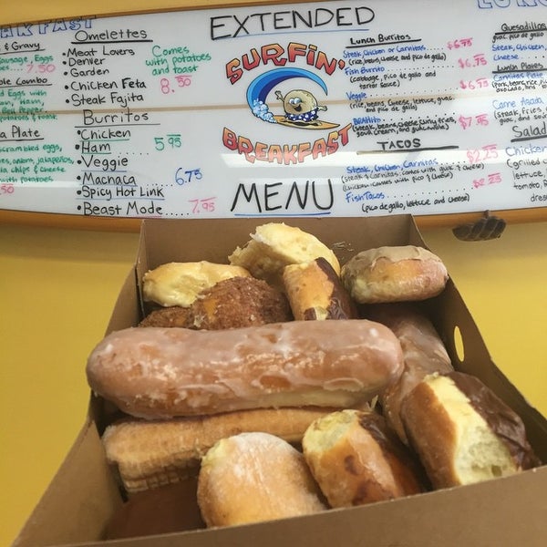 Photo taken at Surfin Donuts by Bryan L. on 4/28/2015