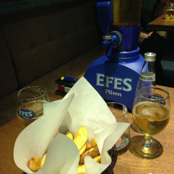 Photo taken at Efes Sports Pub by Elif K. on 5/1/2013