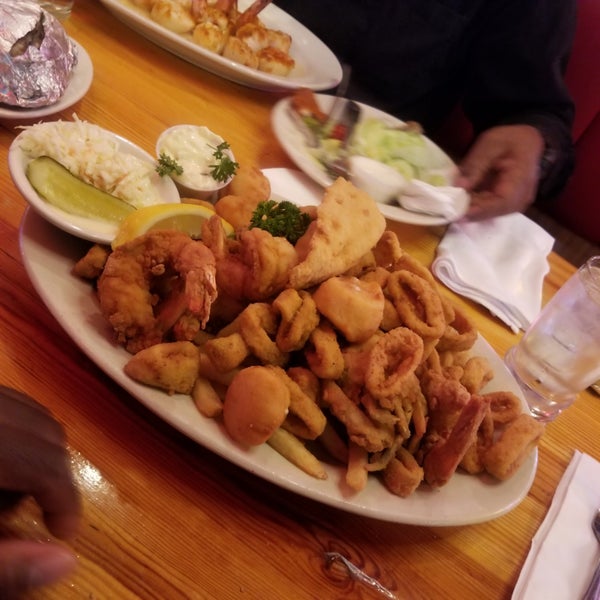 Photo taken at Sammy&#39;s Fish Box Restaurant by Cherron T. on 5/4/2019