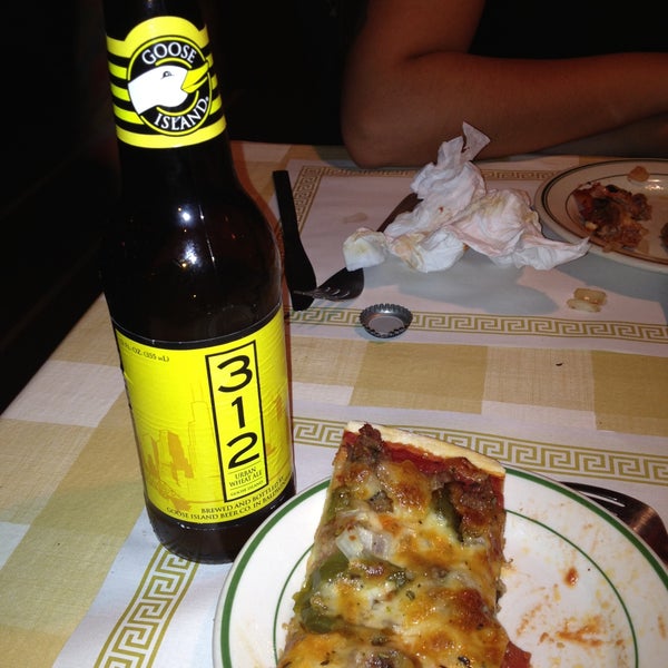 Photo taken at Frank&#39;s Pizzeria &amp; Restaurant by Natalie J. on 4/11/2013