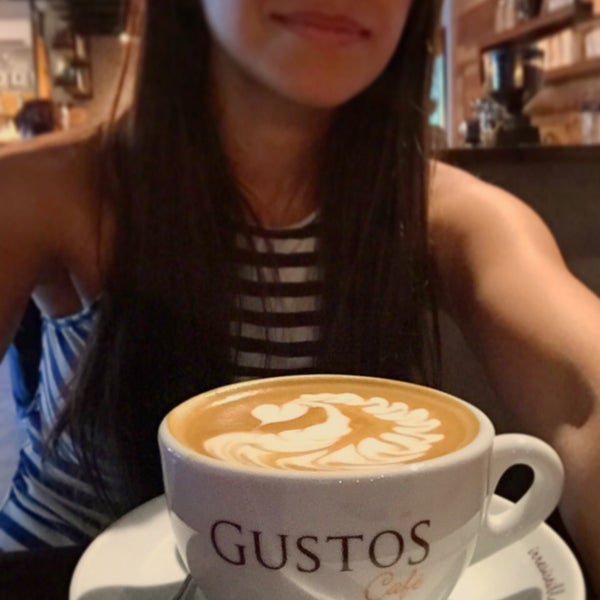 Photo taken at Gustos Coffee Co. by Angélica . on 4/9/2016