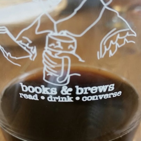 Photo taken at Books &amp; Brews Brewing Company by Michelle W. on 12/19/2014