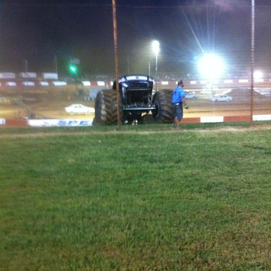 Photo taken at Dixie Speedway Home of the Champions by Jeremy Z. on 9/23/2012