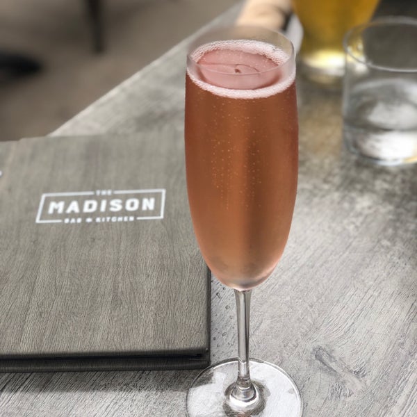 Photo taken at The Madison Bar &amp; Kitchen by Leah M. on 6/9/2019