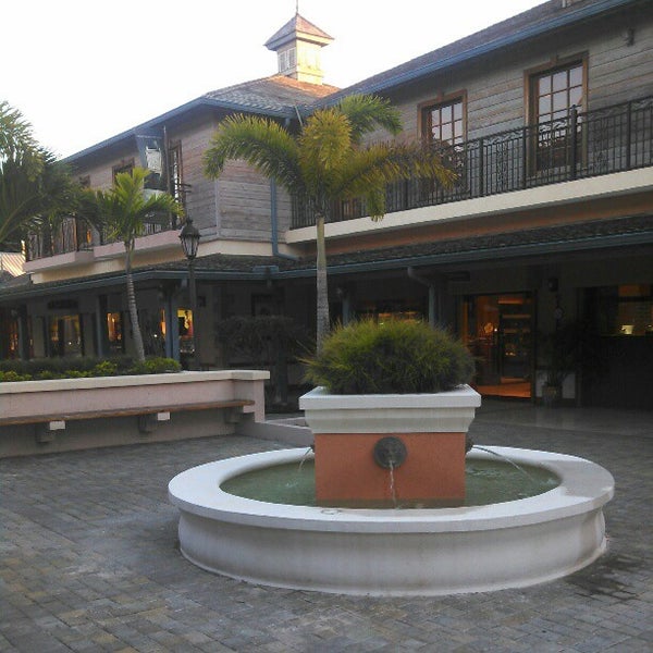 Photo taken at The Shoppes at Rose Hall by Taiwan B. on 11/13/2012