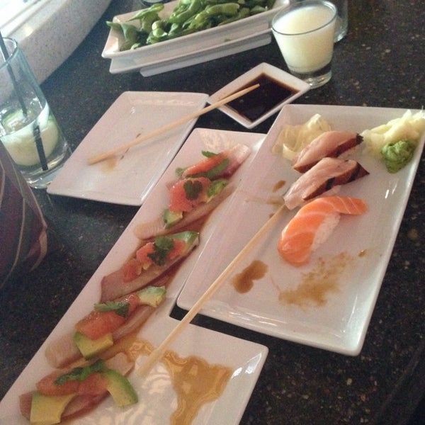 Photo taken at Squid Ink Sushi Bar by Carri on 5/4/2015
