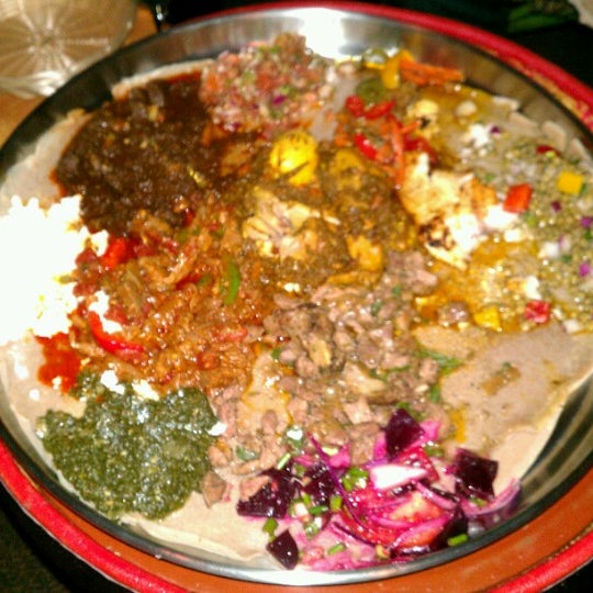 Photo taken at Ras Dashen Ethiopian Restaurant by Liz P. on 1/27/2013