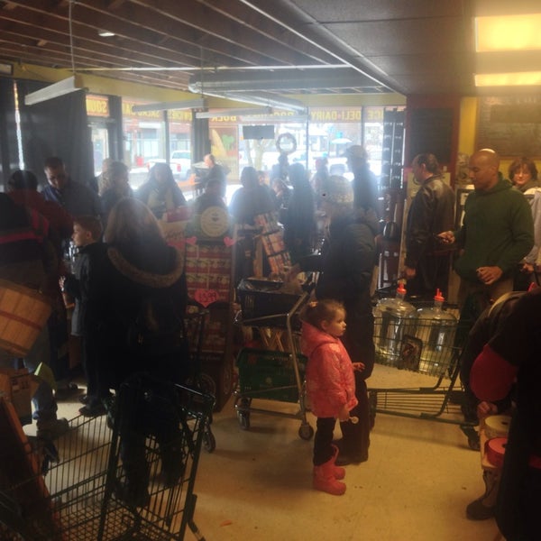 Photo taken at Pogue&#39;s Run Grocer by Chris S. on 1/18/2014