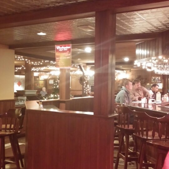 Photo taken at Bratskellar Pizza Pub by Ann C. on 12/16/2013