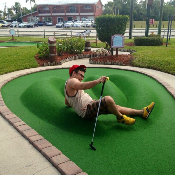 Photo taken at Jungle Golf by Ginger R. on 1/31/2014