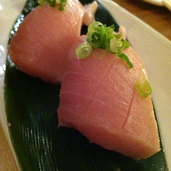 Photo taken at Sushi Ichimoto by Erica C. on 10/1/2013