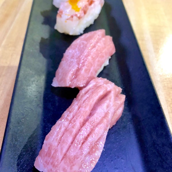 Photo taken at Sushi Ichimoto by Erica C. on 3/25/2018
