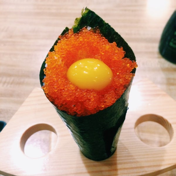 Photo taken at Sushi Ichimoto by Erica C. on 10/1/2014