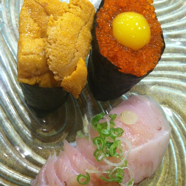 Photo taken at Sushi Ichimoto by Erica C. on 5/30/2013