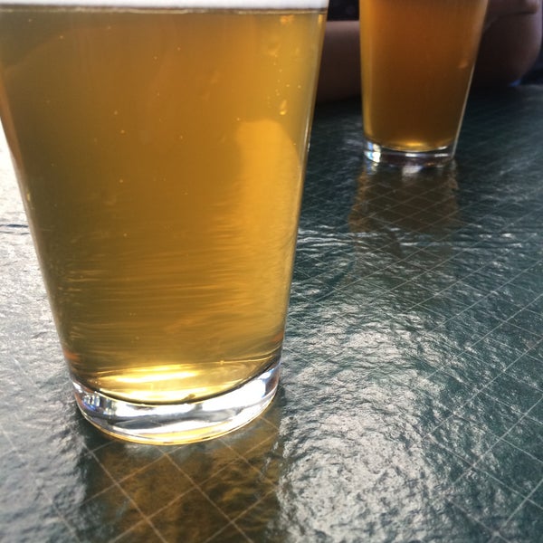 Photo taken at Pacific Coast Brewing Company by Erica C. on 4/13/2015