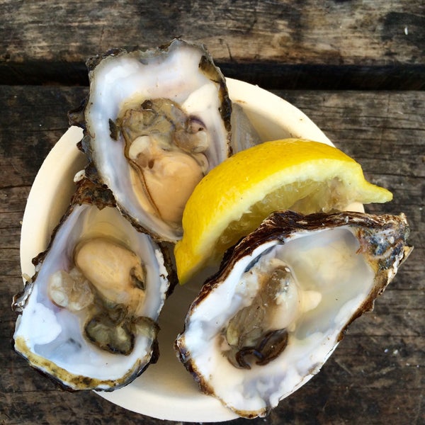 Photo taken at Tomales Bay Oyster Company by Erica C. on 8/14/2015