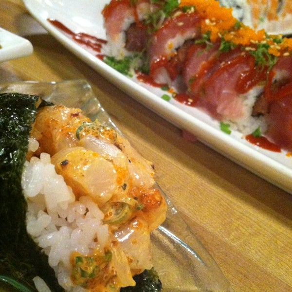 Photo taken at Sushi Ichimoto by Erica C. on 3/9/2013
