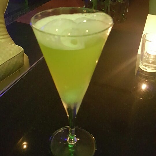 Try the "Behind the Green Door" cocktail.  It bubbles like a geyser and tastes light and fruity.  The bubbling is caused by a pellet of dry ice.  It's not on the menu but still available to order.
